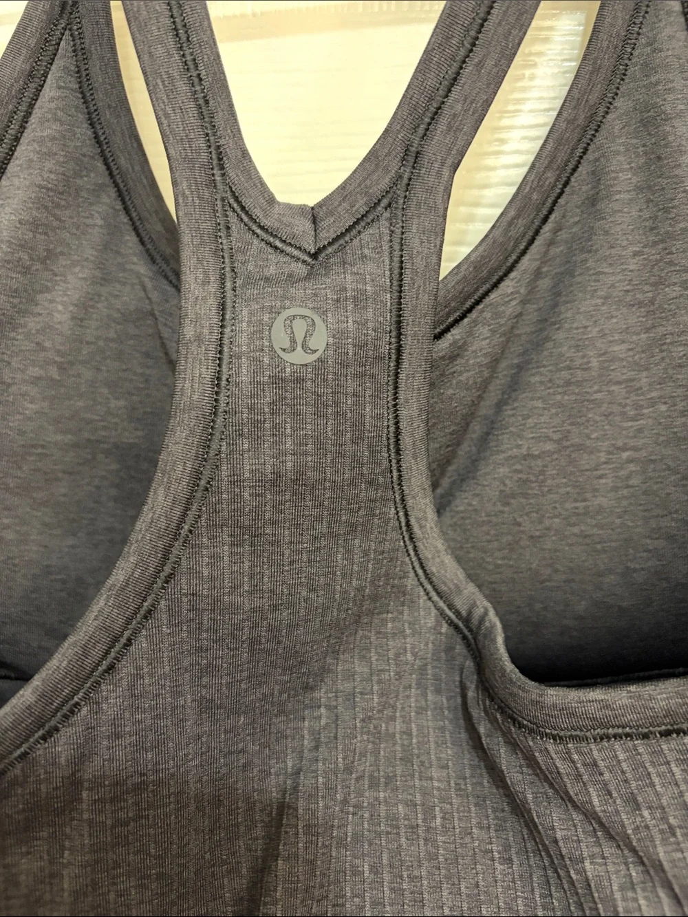 047. Lululemon Ebb To Street Tank II Black size 10 with pads